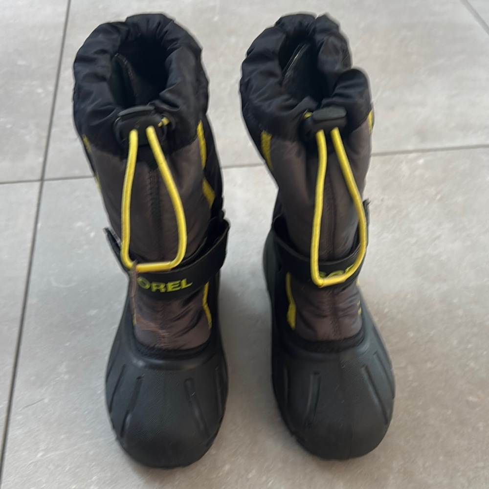 Sorel Kids Black and Yellow Snow Boots